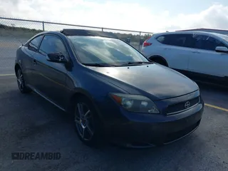 2006 Scion tC with VIN JTKDE167060074288, listed as a IAAI auction lot 37729781 with 119,836 mi miles. Bid and sale history available at carsss.com. Image 1.