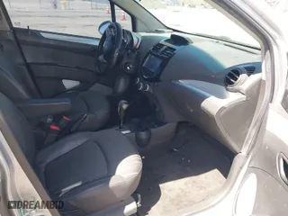 2014 Chevrolet Spark LT with VIN KL8CD6S91EC551097, listed as a IAAI auction lot 41975175 with 98,996 mi miles. Bid and sale history available at carsss.com. Image 5.