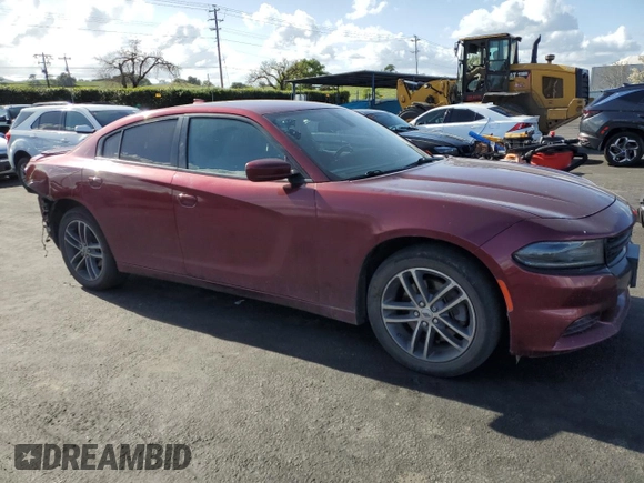2019 Dodge Charger SXT with VIN 2C3CDXJG4KH757928, listed as a Copart auction lot 51670565 with 93,406 mi miles and Salvage Title. Bid and sale history available at DreamBid. Image 4.