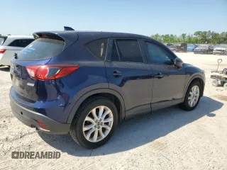 2013 Mazda CX-5 Grand Touring with VIN JM3KE2DE4D0147902, listed as a Copart auction lot 52696685 with 331,168 mi miles and Clean Title. Bid and sale history available at carsss.com. Image 3.