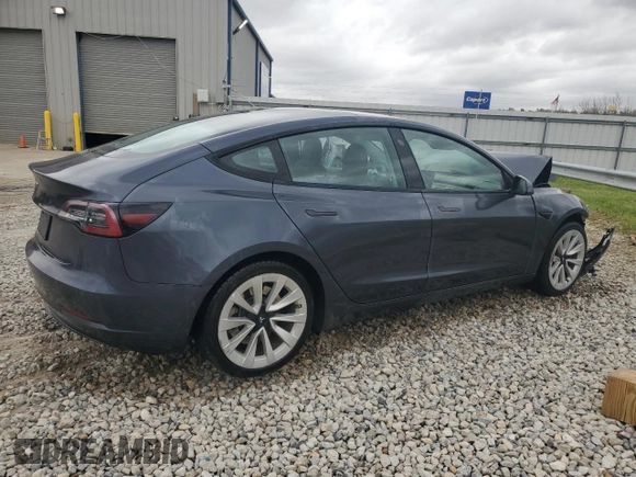 2022 Tesla Model 3 with VIN 5YJ3E1EA4NF371483, listed as a Copart auction lot 49287665 with 59,476 mi miles and Salvage Title. Bid and sale history available at DreamBid. Image 3.