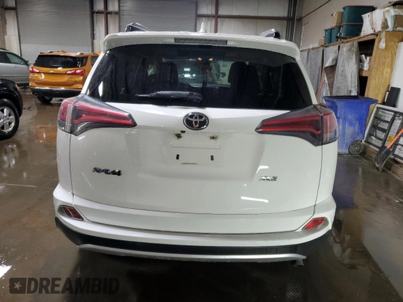 2017 Toyota RAV4 XLE with VIN JTMWFREV7HJ701268, listed as a Copart auction lot 49098185 with 79,314 mi miles and Salvage Title. Bid and sale history available at DreamBid. Image 6.