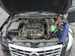 2014 Cadillac XTS Livery z VIN 2G61U5S33E9141464, wystawiony jako Copart lot #52071545 z przebiegiem 231 098 mil mil oraz Tytuł czysty. Historia ofert i sprzedaży dostępna na DreamBid. Obrazek 11.