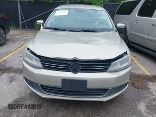 2013 Volkswagen Jetta SE z VIN 3VWDX7AJ2DM255858, wystawiony jako IAAI lot #42306203 z przebiegiem 221 309 mil mil oraz . Historia ofert i sprzedaży dostępna na DreamBid. Obrazek 6.