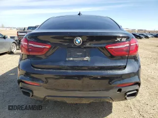 2018 BMW X6 xDrive35i z VIN 5UXKU2C52J0X51407, wystawiony jako Copart lot #54449325 z przebiegiem 125 767 mil mil oraz Szkoda całkowita • Salvage title. Historia ofert i sprzedaży dostępna na DreamBid. Obrazek 6.
