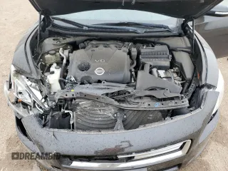 2014 Nissan Maxima SV с VIN 1N4AA5AP7EC486585, выставлен на аукционе Copart как лот 60806895 с пробегом 110 968 миль миль и Списание • Salvage title. История ставок и продаж доступна на DreamBid. Изображение 11.