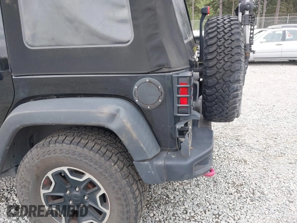 2015 Jeep Wrangler Unlimited Rubicon Hard Rock with VIN 1C4HJWFG6FL757421, listed as a IAAI auction lot 42107514 with 63,997 mi miles and . Bid and sale history available at DreamBid. Image 18.