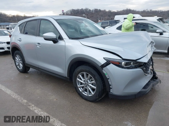2023 Mazda CX-5 S Preferred with VIN JM3KFBCM1P0131070, listed as a IAAI auction lot 41661970 with 31,910 mi miles and . Bid and sale history available at carsss.com. Image 1.