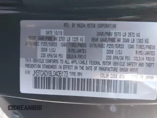 2020 Mazda CX-9 Grand Touring with VIN JM3TCADY8L0405173, listed as a IAAI auction lot 41701533 with 58,119 mi miles and . Bid and sale history available at DreamBid. Image 9.