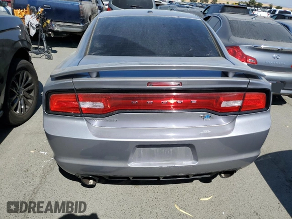2014 Dodge Charger RT Plus with VIN 2C3CDXCT4EH307940, listed as a Copart auction lot 64035484 with 129,665 mi miles and Salvage Title. Bid and sale history available at carsss.com. Image 6.