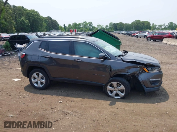 2019 Jeep Compass Altitude with VIN 3C4NJDBB1KT734970, listed as a IAAI auction lot 42483357 with 59,425 mi miles and . Bid and sale history available at DreamBid. Image 13.