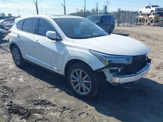 2020 Acura RDX w/Technology Pkg with VIN 5J8TC1H52LL006185, listed as a IAAI auction lot 41457828 with 59,998 mi miles. Bid and sale history available at carsss.com. Image 1.