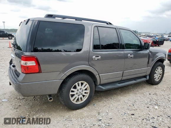 2014 Ford Expedition XLT with VIN 1FMJU1H54EEF41878, listed as a Copart auction lot 59671515 with 95,082 mi miles and Salvage title. Bid and sale history available at DreamBid. Image 3.