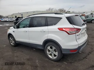 2016 Ford Escape SE with VIN 1FMCU9G91GUC68547, listed as a Copart auction lot 52770635 with 100,111 mi miles and Salvage Title. Bid and sale history available at DreamBid. Image 2.