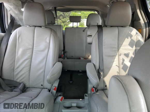 2012 Toyota Sienna XLE AAS с VIN 5TDYK3DC8CS202329, выставлен на аукционе Copart как лот 59340965 с пробегом Не указан миль и Списание • Salvage title. История ставок и продаж доступна на DreamBid. Изображение 10.