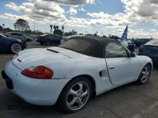 1999 Porsche Boxster z VIN WP0CA2984XU629987, wystawiony jako Copart lot #51366845 z przebiegiem Nie podano mil oraz Czysty tytuł • Clean title. Historia ofert i sprzedaży dostępna na DreamBid. Obrazek 3.