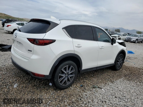 2018 Mazda CX-5 Grand Touring with VIN JM3KFBDM9J0468463, listed as a Copart auction lot 54524805 with 73,389 mi miles and Salvage Title. Bid and sale history available at DreamBid. Image 3.