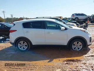 2019 Kia Sportage LX with VIN KNDPM3AC3K7536691, listed as a IAAI auction lot 41733413 with 77,095 mi miles. Bid and sale history available at carsss.com. Image 13.