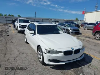 2014 BMW 3 Series 328i with VIN WBA3A5C58EP602669, listed as a IAAI auction lot 42514389 with 187,330 mi miles and . Bid and sale history available at DreamBid. Image 1.