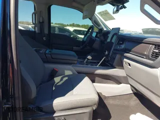 2024 Ford F-150 Lightning Flash with VIN 1FT6W3L75RWG30755, listed as a IAAI auction lot 41817158 with 1,932 mi miles and . Bid and sale history available at DreamBid. Image 5.