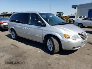 2007 Chrysler Town & Country LWB LX with VIN 2A4GP44R17R245782, listed as a Copart auction lot 72064294 with 160,386 mi miles and Salvage Title. Bid and sale history available at carsss.com. Image 4.