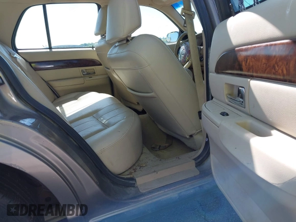 2006 Mercury Grand Marquis LS Premium z VIN 2MEFM75V06X629469, wystawiony jako IAAI lot #42308560 z przebiegiem 220 783 mil mil oraz . Historia ofert i sprzedaży dostępna na DreamBid. Obrazek 8.
