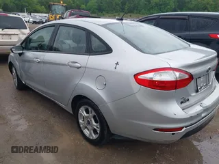 2015 Ford Fiesta SE with VIN 3FADP4BJ4FM204354, listed as a IAAI auction lot 42117676 with 146,110 mi miles and . Bid and sale history available at DreamBid. Image 3.