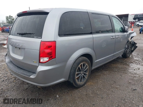 2018 Dodge Grand Caravan SE Plus with VIN 2C4RDGBG0JR202679, listed as a IAAI auction lot 40861837 with 133,046 mi miles and . Bid and sale history available at DreamBid. Image 4.