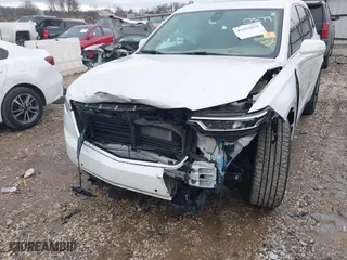 2021 Cadillac XT6 Premium Luxury with VIN 1GYKPFRS0MZ100879, listed as a IAAI auction lot 41083030 with 56,502 mi miles. Bid and sale history available at carsss.com. Image 6.