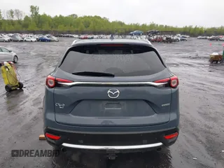 2021 Mazda CX-9 Grand Touring z VIN JM3TCBDY8M0528365, wystawiony jako IAAI lot #42222394 z przebiegiem 44 850 mil mil oraz . Historia ofert i sprzedaży dostępna na DreamBid. Obrazek 16.
