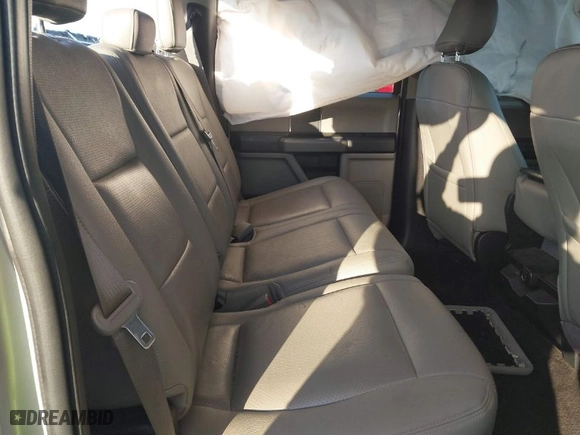 2018 Ford F-150 XL with VIN 1FTEW1E57JFC31779, listed as a IAAI auction lot 41784467 with 142,676 mi miles. Bid and sale history available at carsss.com. Image 8.