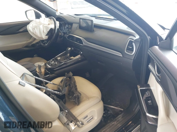 2018 Mazda CX-9 Grand Touring with VIN JM3TCBDY0J0216195, listed as a IAAI auction lot 41976122 with 90,083 mi miles and . Bid and sale history available at DreamBid. Image 5.