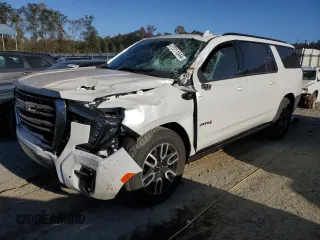 2024 GMC Yukon XL AT4 with VIN 1GKS2HKLXRR329181, listed as a Copart auction lot 77211544 with 2,080 mi miles and Salvage Title. Bid and sale history available at carsss.com. Image 1.