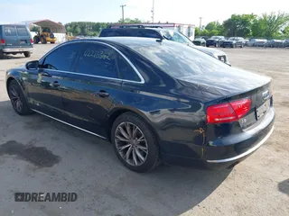 2012 Audi A8 with VIN WAUAVAFD8CN029546, listed as a IAAI auction lot 42216382 with 144,989 mi miles and . Bid and sale history available at DreamBid. Image 3.