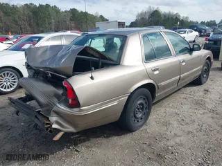 2005 Mercury Grand Marquis GS with VIN 2MEFM74W55X603152, listed as a IAAI auction lot 41872534 with 84,290 mi miles. Bid and sale history available at carsss.com. Image 4.