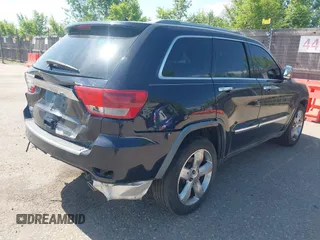 2011 Jeep Grand Cherokee Overland with VIN 1J4RS6GG9BC613396, listed as a IAAI auction lot 42490889 with 150,601 mi miles and . Bid and sale history available at DreamBid. Image 4.