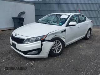 2012 Kia Optima LX with VIN KNAGM4A78C5289431, listed as a IAAI auction lot 42026917 with 148,867 mi miles and . Bid and sale history available at carsss.com. Image 2.