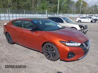 2020 Nissan Maxima SR z VIN 1N4AA6EV9LC383681, wystawiony jako IAAI lot #41953773 z przebiegiem 86 702 mil mil oraz . Historia ofert i sprzedaży dostępna na DreamBid. Obrazek 1.