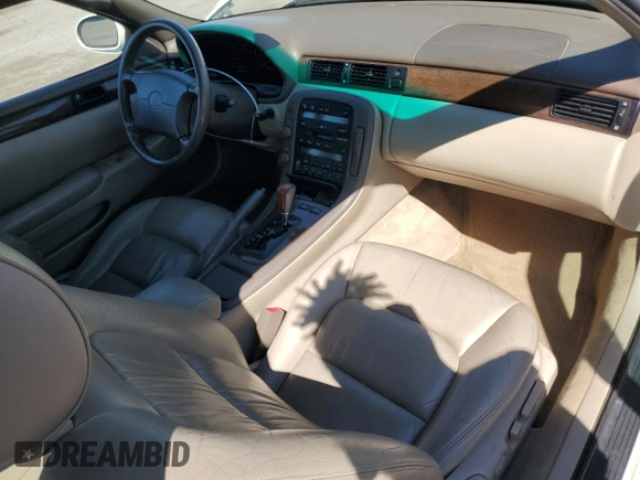 1998 Lexus SC 300 z VIN JT8CD32Z5W1004027, wystawiony jako Copart lot #48164775 z przebiegiem 132 030 mil mil oraz Szkody całkowita. Historia ofert i sprzedaży dostępna na DreamBid. Obrazek 8.