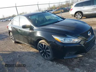2018 Nissan Altima SV with VIN 1N4AL3AP0JC209978, listed as a IAAI auction lot 41958173 with 104,425 mi miles and . Bid and sale history available at carsss.com. Image 1.