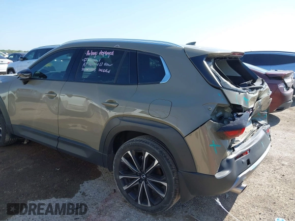2024 Mazda CX-50 Premium z VIN 7MMVABDYXRN229669, wystawiony jako IAAI lot #41999385 z przebiegiem 10 882 mil mil oraz . Historia ofert i sprzedaży dostępna na DreamBid. Obrazek 3.