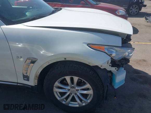 2014 Infiniti QX70 with VIN JN8CS1MW7EM413033, listed as a IAAI auction lot 41993136 with 148,838 mi miles and . Bid and sale history available at DreamBid. Image 18.