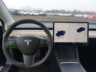 2023 Tesla Model 3 with VIN 5YJ3E1EA1PF664311, listed as a IAAI auction lot 41839591 with 17,416 mi miles and . Bid and sale history available at carsss.com. Image 18.