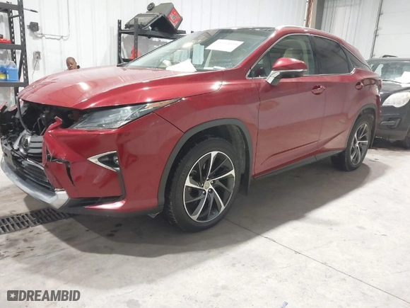 2017 Lexus RX with VIN 2T2BZMCA6HC112857, listed as a IAAI auction lot 41614059 with 100857 miles. Bid and sale history available at carsss.com. Image 2.