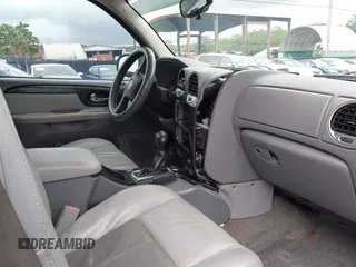 2005 GMC Envoy SLT z VIN 1GKDS13S152161472, wystawiony jako IAAI lot #40110978 z przebiegiem 141 908 mil mil oraz . Historia ofert i sprzedaży dostępna na DreamBid. Obrazek 5.
