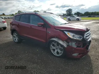 2019 Ford Escape Titanium with VIN 1FMCU0J98KUC00873, listed as a Copart auction lot 61674305 with 53,554 mi miles and Salvage title. Bid and sale history available at DreamBid. Image 4.