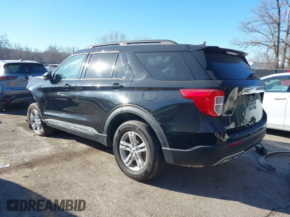 2023 Ford Explorer XLT with VIN 1FMSK8DHXPGB70042, listed as a IAAI auction lot 41429453 with 30,857 mi miles. Bid and sale history available at carsss.com. Image 3.