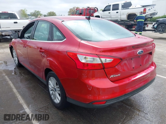 2012 Ford Focus SEL with VIN 1FAHP3H27CL338414, listed as a IAAI auction lot 41925915 with 128,123 mi miles. Bid and sale history available at carsss.com. Image 3.