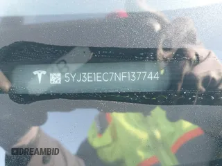 2022 Tesla Model 3 Performance z VIN 5YJ3E1EC7NF137744, wystawiony jako IAAI lot #41427701 z przebiegiem Nie podano mil oraz . Historia ofert i sprzedaży dostępna na DreamBid. Obrazek 9.