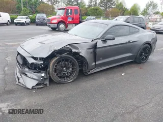 2021 Ford Mustang GT z VIN 1FA6P8CF0M5105060, wystawiony jako IAAI lot #41967671 z przebiegiem 27 626 mil mil oraz . Historia ofert i sprzedaży dostępna na DreamBid. Obrazek 2.